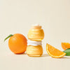 itrus Brightening cream jars with citrus fruits