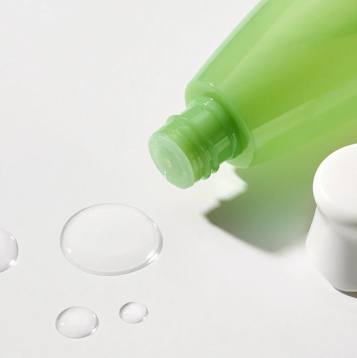 Frudia Green Grape Pore Control Toner bottle, vegan skincare open bottle on white backgound