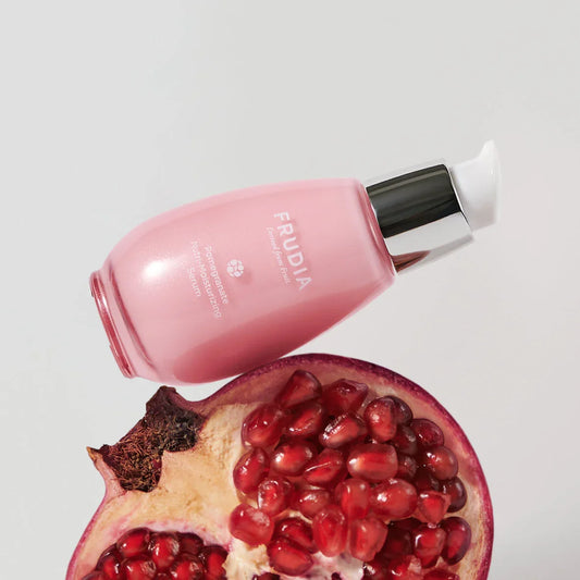Frudia Pomegranate Nutri-Moisturizing Serum bottle, vegan firming skincare product with Pomegranate