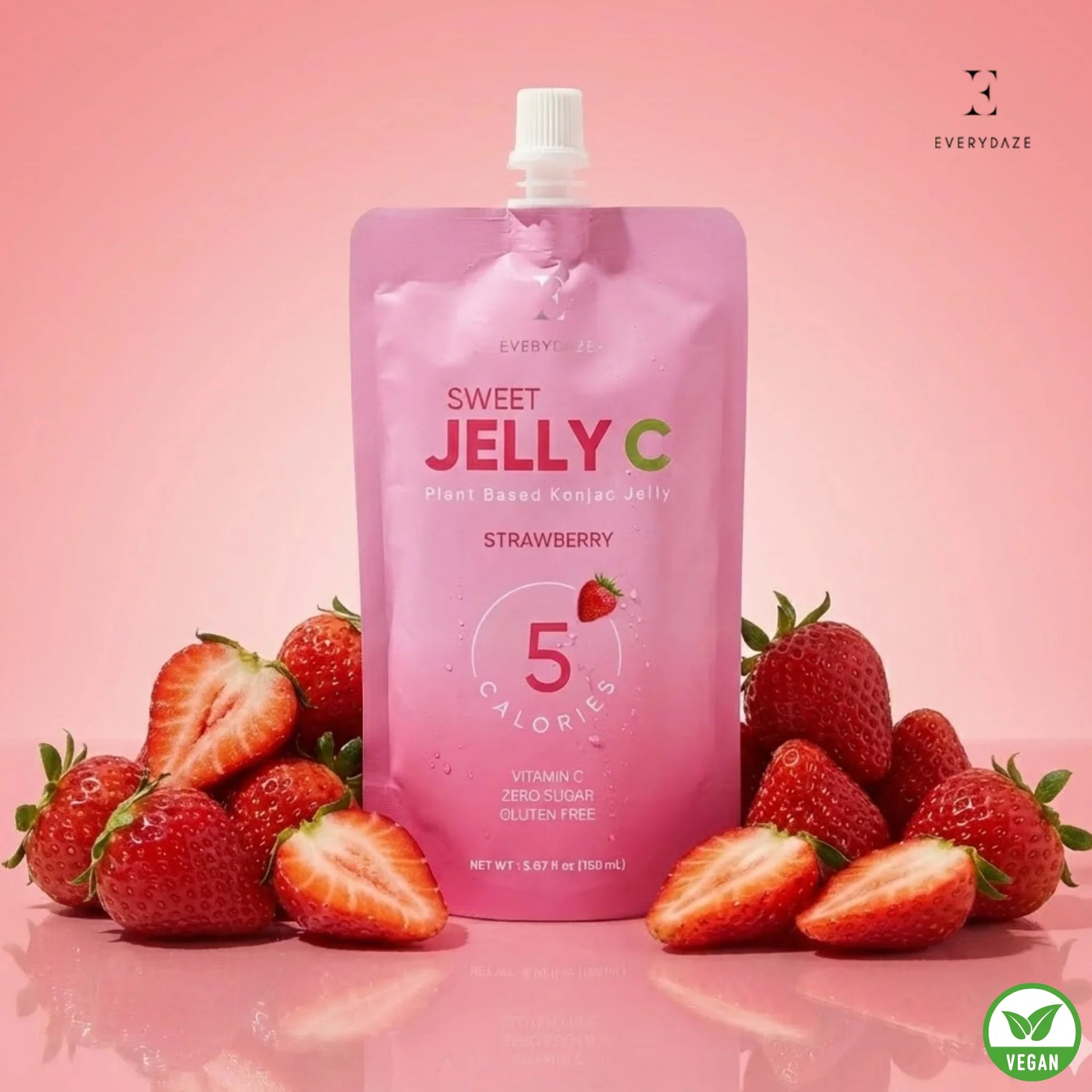 Strawberry Sweet Jelly C with Vitamin C, zero sugar, gluten-free, vegan, 5 calories, surrounded by fresh strawberries on pink background
