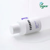 COSNORI Panthenol Barrier Toner with bottle lying on white surface