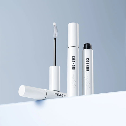 Cosnori Eyelash serums without cap on white and blue background 